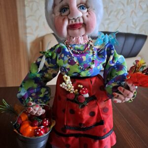Handmade Rag doll Grandma brought natural treats from the garden.