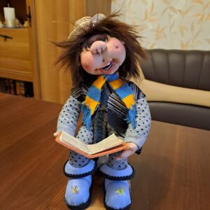 Handmade Rag doll reading pleasure