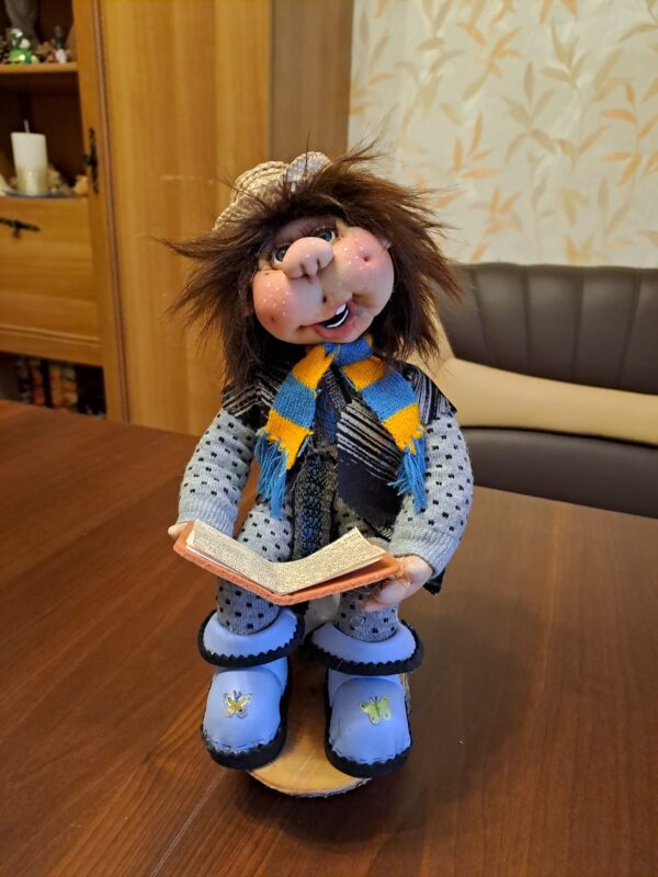 Handmade Rag doll reading pleasure
