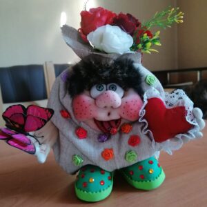 Handmade Rag doll when flowers are on your head and ladybugs are on your tongue